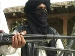 Taliban soldiers display their weapons Stock Footage