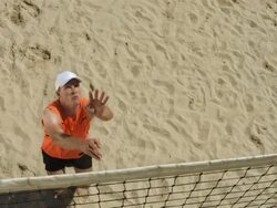 HD Super Slow-Mo: Beach Volleyball Player In Serving Action Stock Footage