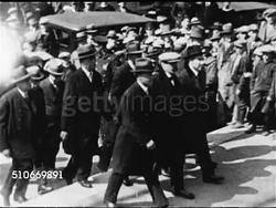 1920: THE RED SCARE: SACCO-VANZETTI CASE: Convicted Italians Nicola Sacco & Bartolomeo Vanzetti being escorted from police wagon to building steps, officials stopping for photographer to take photos. Anti-communism, xenophobia, controversial sentence Instructional Video
