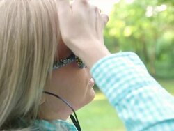 Woman listening to music Stock Footage