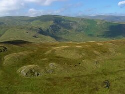 Aerial view over the fells and dales of Shap Fell in the Lake District / Cumbria, England Stock Footage