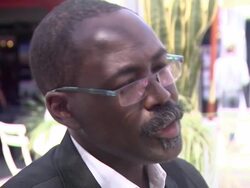 INTERVIEW: Mahamat-Saleh Haroun on the reality of war at the L'Homme Qui Crie (Screaming Man) Interviews: Cannes Film Festival 2010 at Cannes . (Footage by WireImage Video/GettyImages) Stock Footage