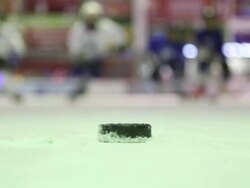 hockey players fighting for the puck Stock Footage