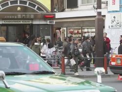 WS PAN People at street of Kaminari Gate of Sensoji Temple in Asakusa / Tokyo, Tokyo-To, Japan Stock Footage