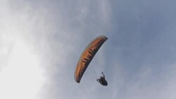 Paraglider Soaring In The Sky Stock Footage