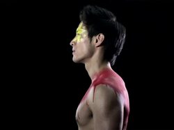 Man with Chinese flag painted on face and chest Stock Footage