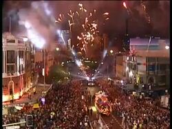 WA high angle, Street parade at Sydney Gay & Lesbian Mardi Gras, Fireworks overhead Stock Footage