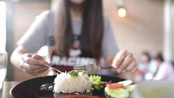 Young woman having lunch in restaurant cafe. Stock Footage