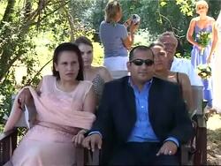 Couples exchange wedding rings on elephant back News Clip