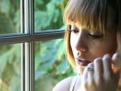 Married woman wipes away tears Stock Footage