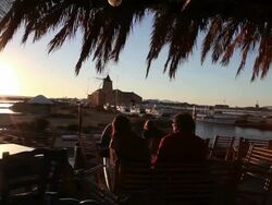 Mozia (Motya), tourists in a cafÃƒÂ© watching the sunset Stock Footage