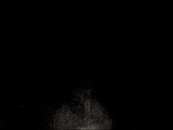 white dust exploding on black slow motion Stock Footage