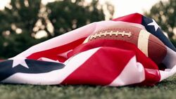 American football ball with us national flag Stock Footage