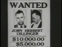 A John Dillinger wanted poster advertises rewards for his capture. News Clip