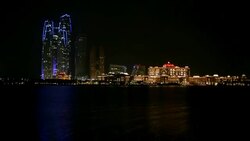 Abu Dhabi skyline at night Stock Footage