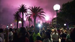 Tourists enjoy fireworks in Sydney, Australia during a New Year's celebration. Stock Footage