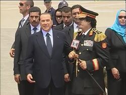 Gadhafi begins first visit as bilateral relations improve News Clip