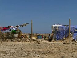 MS Shot of child crying in refugee camp at desert / Djibouti Stock Footage