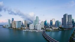 View from Brickell Key, a small island covered in apartment towers, towards the Miami skyline, Miami, Florida, USA - Time lapse Stock Footage