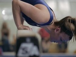  WS Gymnast performing hand stand on balance beam / Vancouver, British Columbia, Canada Stock Footage