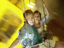 Young people on Chairoplane Stock Footage