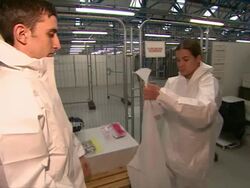 NHS Staff protective clothing suit up in Ebola training News Clip