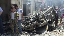 CLEAN : Suicide bombers kill 20 outside Syria shrine News Clip