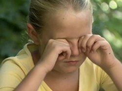 Girl rubbing her eyes Stock Footage
