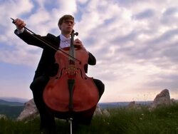 CRANE: Playing Cello Outdoors Stock Footage