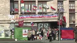 Reax as militia seize broadcasting centre and Russian TV is aired again News Clip