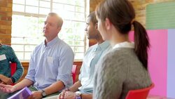Man talking in group therapy session Stock Footage