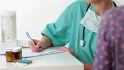 Doctor filling medical prescription Stock Footage