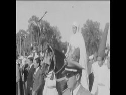 CAN947 HASSAN ATTENDS AID EL-KEBIR FESTIVAL Instructional Video