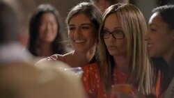 Women friends pose for smartphone selfie with drinks at bar Stock Footage