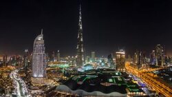 United Arab Emirates, Dubai, the Burj Khalifa, elevated view looking over the Dubai Mall - time lapse Stock Footage
