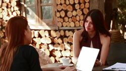 Two businesswoman meeting and talking about their task Stock Footage