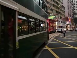 MS Busy street with railcars / Hong Kong, China Stock Footage