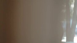 Hip young businessman writes on white-board while female colleague takes notes on tablet (dolly shot) Stock Footage