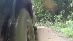 4x4 car pick-up rides through the mud in the forest Stock Footage