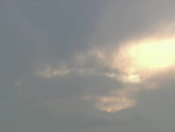 WS PAN View of Large cloud moving across and covering sun / Namaqualand, Northern Cape, South Africa Stock Footage