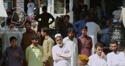 Small crowd gathered on the street, Swat Stock Footage