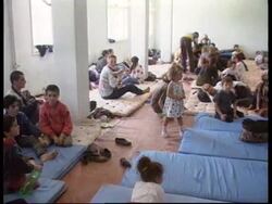 Albania - Refugees flee border to escape fighting News Clip