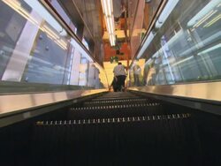 MS POV Young man moving up on escalator / Tokyo, Kanto, Japan Stock Footage
