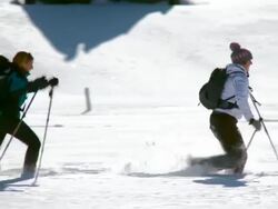 HD: Running In Snow With Snowshoes Stock Footage