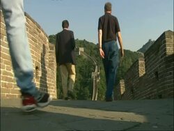 People walking along Great Wall of China, low angle, Mutianyu, China Stock Footage