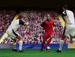 Footballer dribbling ball past opponents  Stock Footage