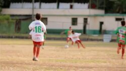 Quick soccer player fakes out opponents in scrimmage match Stock Footage