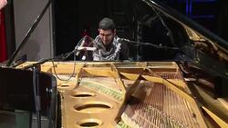 CLEAN : The pianist who escaped war in Syria and brought song to Germany News Clip