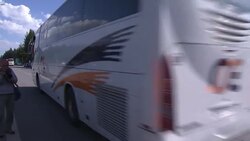 Pro-migrant protesters near camp Instructional Video