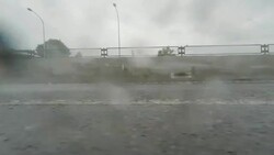 Car driving at rainy day - side view - 4K Stock Footage